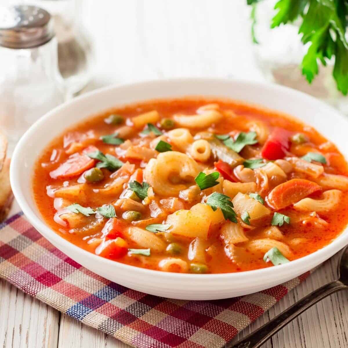 white bowl of minestrone soup
