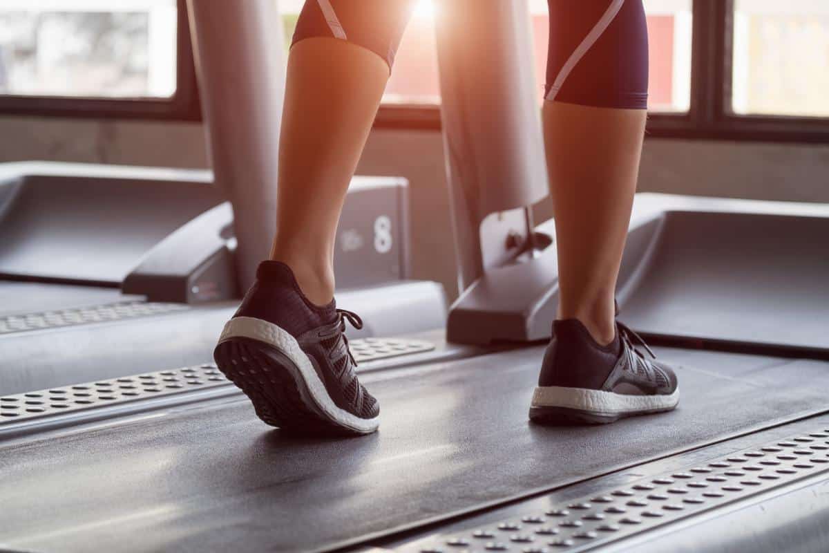legs running or walking on a treadmill