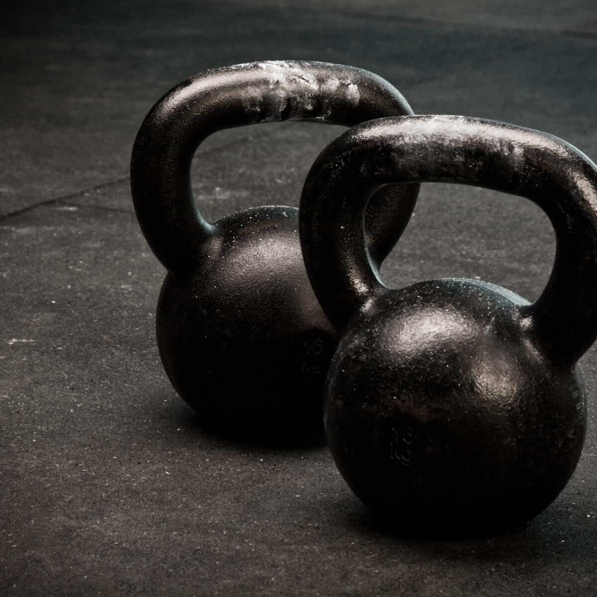 kettlebells on black floor